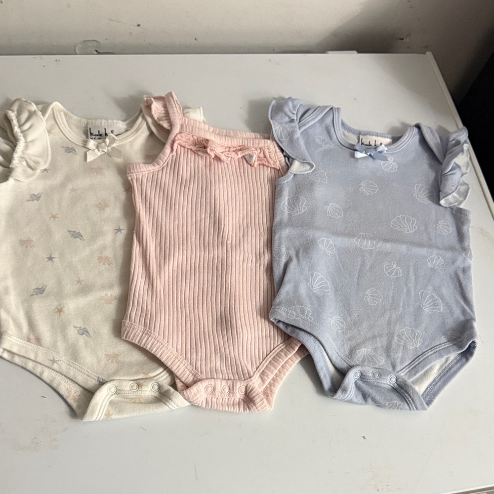 Nicole Miller Cream, Pink, and Blue Bodysuit Trio